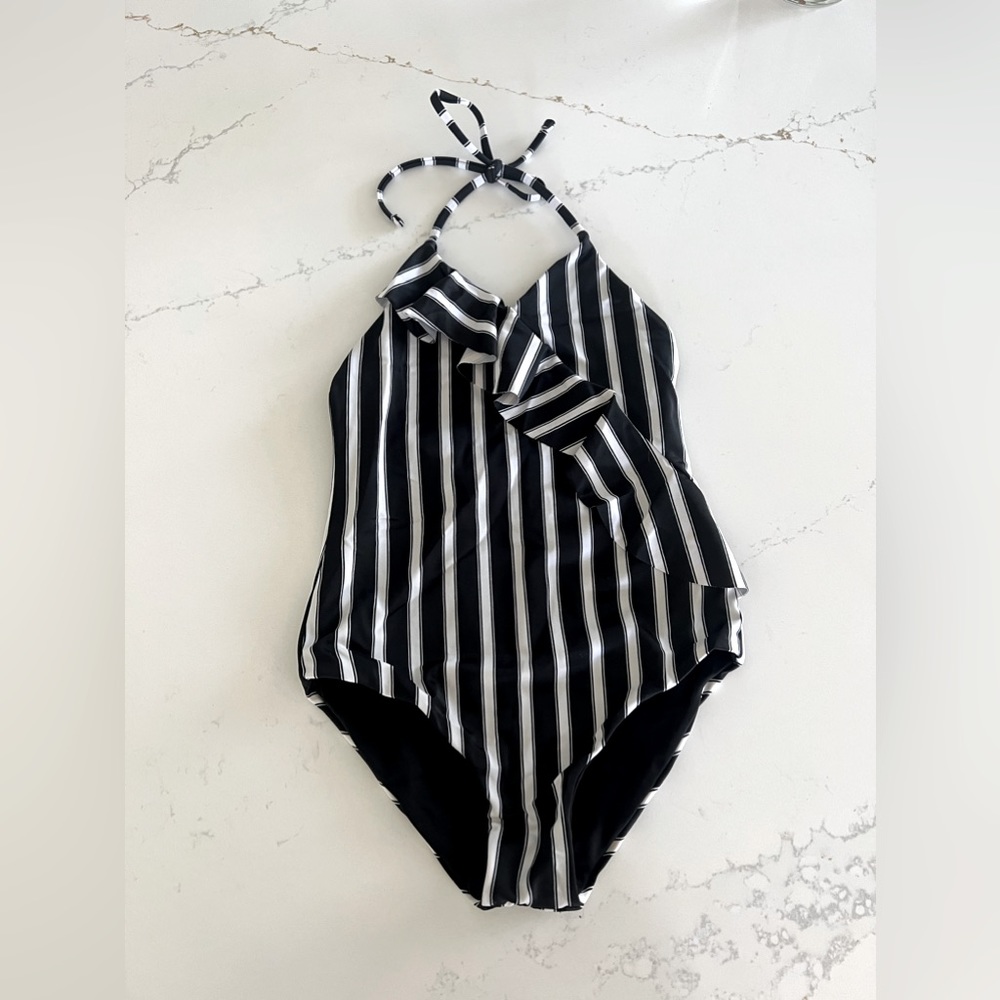 Tori praver bathing suit, size L runs smaller like (m)